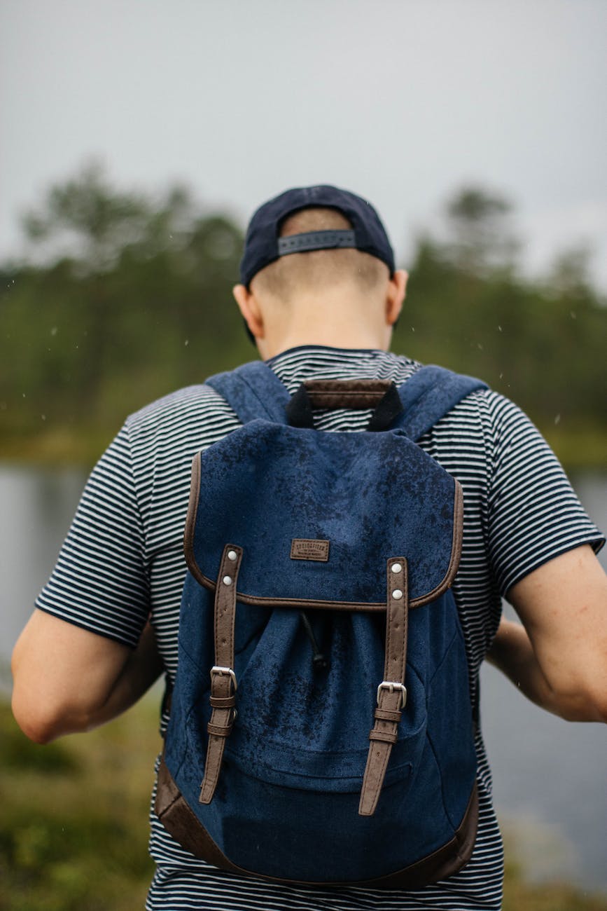 man wearing black backpack