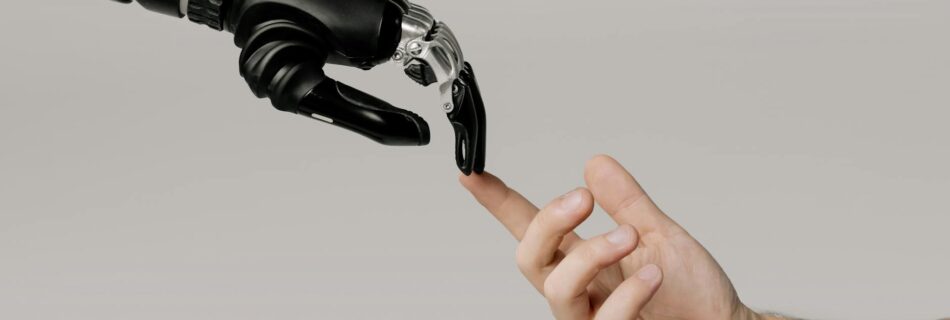 bionic hand and human hand finger pointing